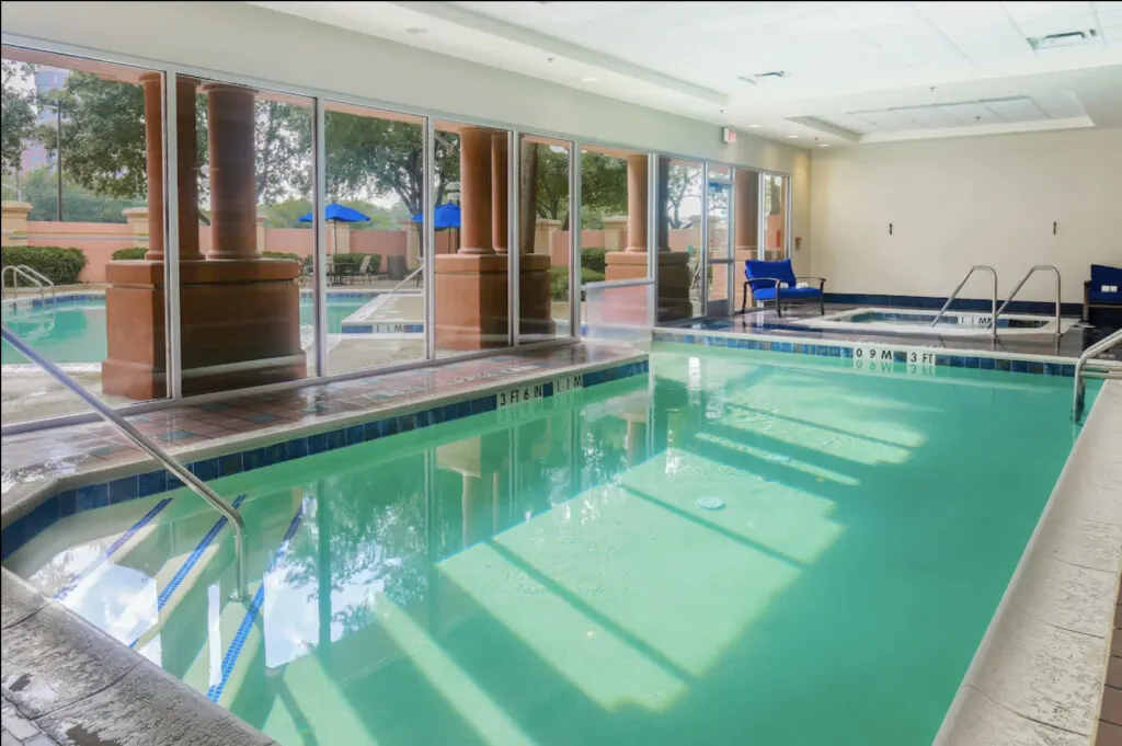 Sheraton Suites Market Center Dallas indoor to outdoor pool connected - hotels with indoor pool and outdoor pool Dallas