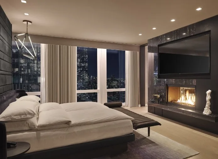 Bedroom Equinox Hotel, a hotel with an indoor pool.