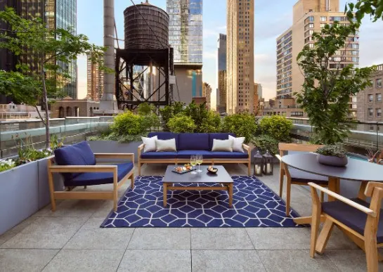 View of The Park Hyatt from the rooftop, a hotel with an indoor pool in NYC.