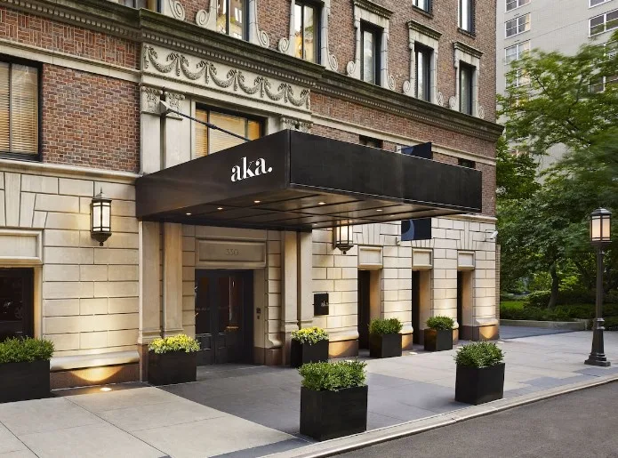 View of AKA Sutton Place from outside, a hotel with an indoor pool in NYC.