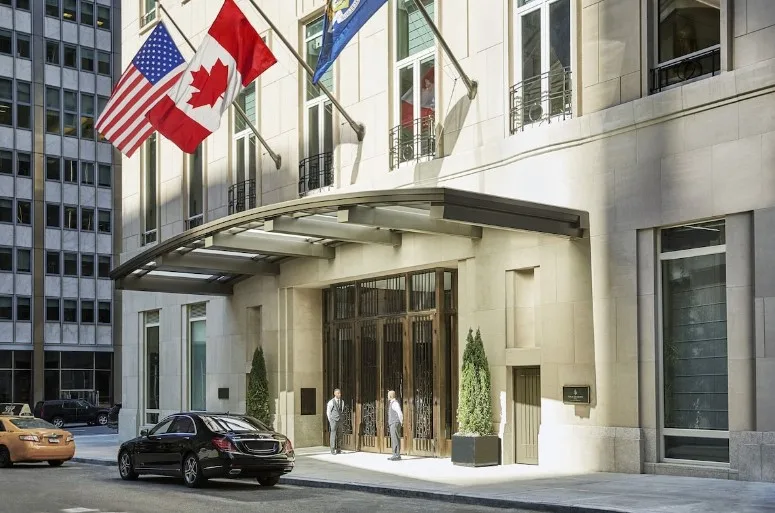 View of the building, an indoor pool in NYC in a hotel.