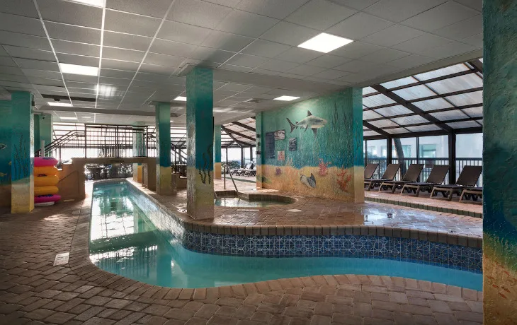 Compass cove resort in Myrtle beach indoor pool lazy river and indoor jacuzzis with paintings of sea life 
