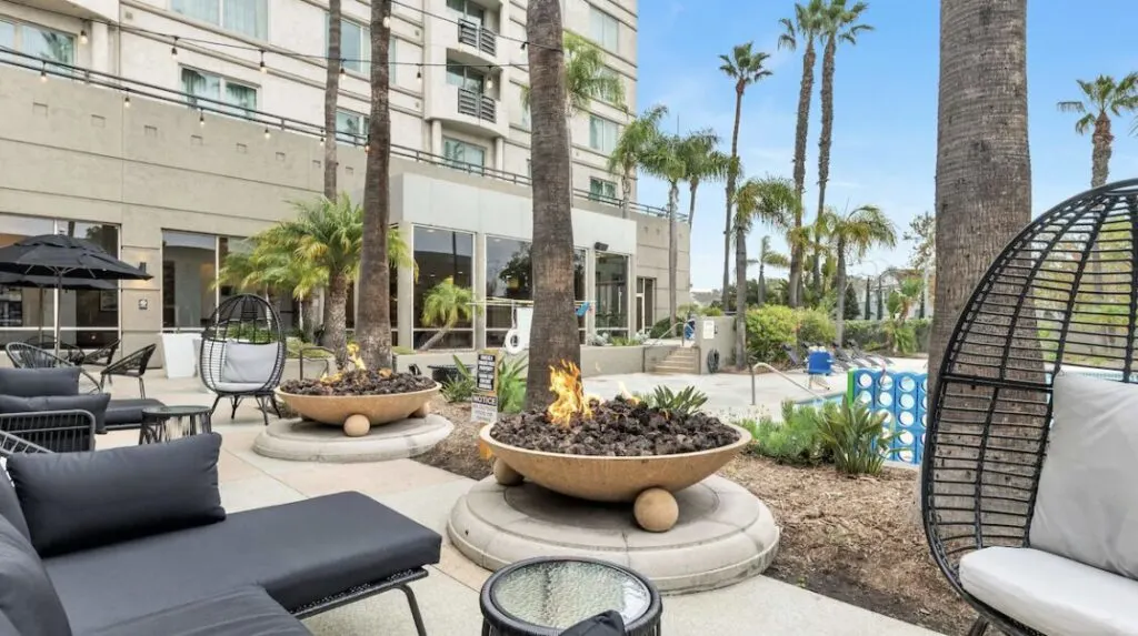 social area and outdoor terrace with fire pits at DoubleTree by Hilton Hotel San Diego - Mission Valley 
