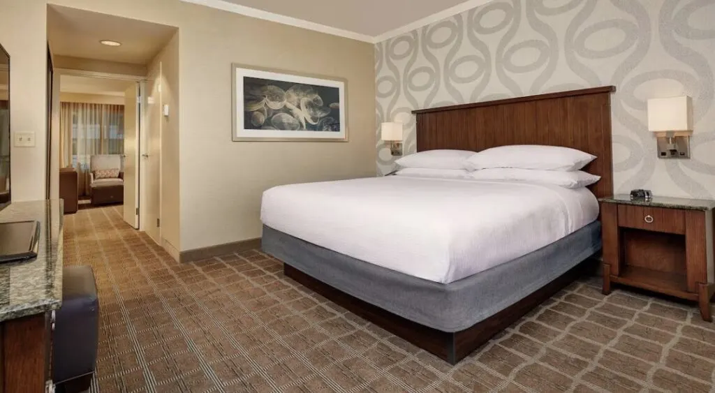 spacious hotel room at Embassy Suites San Diego La Jolla 