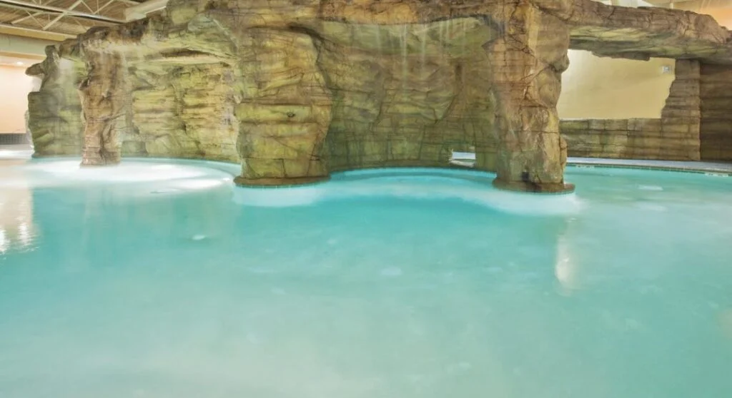 cool cave-like hotel indoor pool at Holiday Inn & Suites Virginia Beach - North Beach