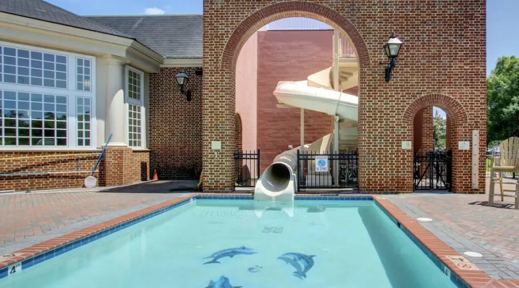 water slide at hotel with indoor and outdoor pools in Virginia Beach, The Founders Inn and Spa