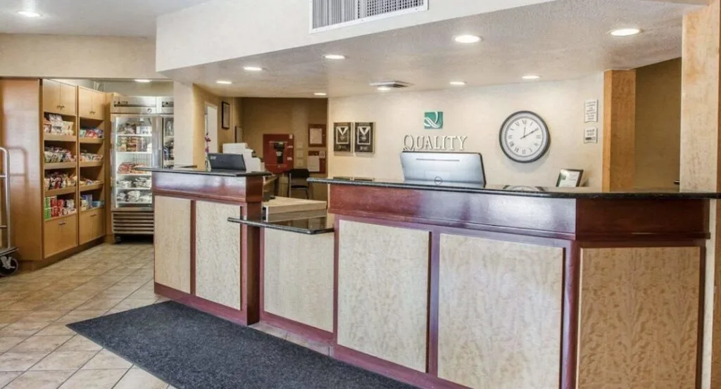 Quality Inn & Suites Denver International Airport hotel lobby with indoor pool 