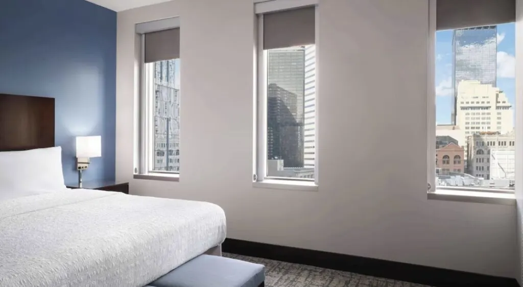 large windows in hotel room in Denver CO Homewood Suites by Hilton Denver Downtown-Convention Center